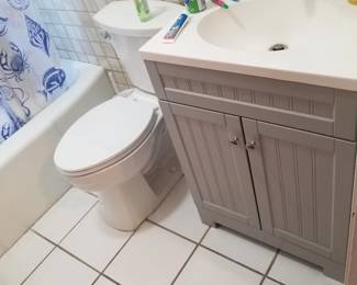 Updated bath vanity; commode