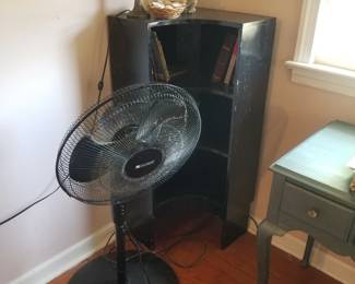Bookcase; floor fan