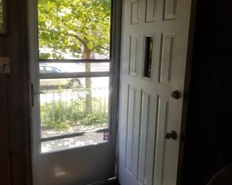 Newer storm door; entry door