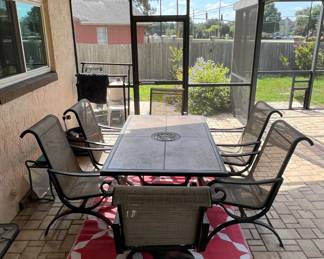 Phi Villa Piece Tile Top Patio Dining Set with Swivel Chairs