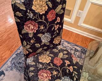 Glass Dining Table with Ornate Traditional Chairs and Floral Upholstered Chairs fourth image