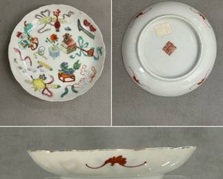 A Chinese porcelain dish with scalloped rim, 6" wide, interior decorated with famille rose enamels, the design features "precious objects" and auspicious symbols, such as a Fu dog, ruyi scepter, books, scrolls, incense burner, and flowers. Outside rim with iron red bats, and an iron red seal mark to the base.