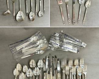 International Silver King Frederik-Royale Empress silver plate flatware service for 12, each setting includes includes dinner fork, salad fork, dinner knife, tablespoon, teaspoon, demitasse spoon, and cocktail or oyster fork. There are an additional 12 teaspoons, and matching pattern serving utensils hostess set.