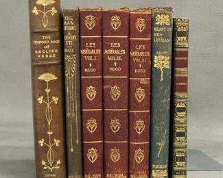 Antique books including The Oxford Book of English Verse; The Man Without a Country Etc., by Edward Hale; Les Misérables volumes I, II, and III by Victor Hugo; and Heart of Mid-Lothian by Sir Walter Scott