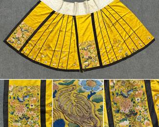 More views of the wonderful 19th-century Han Chinese women’s silk mamianqun (horse-face skirt) featuring exquisite gold-wrapped and silk-on-silk embroidery including Peking knots or “forbidden stitch” on a yellow ground, depicting delicate flowers, fruits, bats, and butterflies