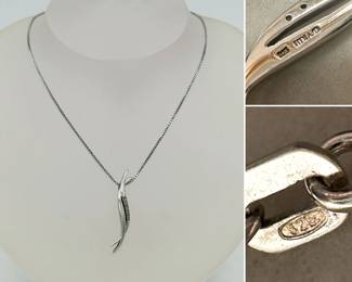 A sterling silver and five diamonds pendant necklace