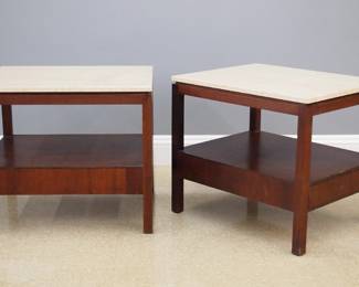 A pair of Mid Century Modern end tables. Teak construction with Travertine tops, each features a lower shelf with pull out skirt drawer and open legs. Original finish with some wear. Each 30 x 24 x 26" high overall. ESTIMATE $400-600