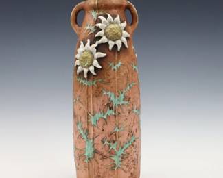 A late 19th century Amphora Art Pottery vase. Molded body with floral design, multi-color decoration and Gilded detail. Impressed "Amphora / Austria" with Crown marks. Minor wear. 13 1/2" high. ESTIMATE $300-400