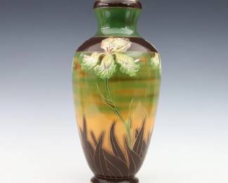 A turn of the century Royal Bonn Art Pottery vase. Baluster form with multi-color Iris decoration and Gilded detail. Printed "Royal Bonn / Germany" with impressed and painted marks. Minor wear and crazing. Up to 14" high. ESTIMATE $300-400