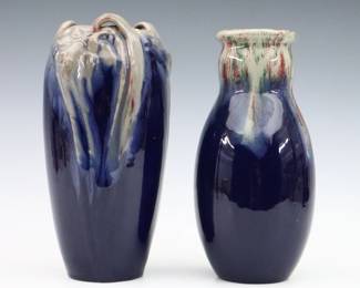 Two early 20th century Michael Andersen & Son Art Pottery vases. Molded bodies with multi-color drip glaze on dark Blue grounds, one with reticulated handles. Impressed "MA & S" and "Denmark" marks. Minor wear and crazing. Up to 9 1/2" high. ESTIMATE $200-400