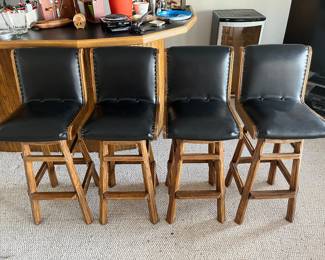 Four Ranch Oak (or similar) bar stools.
