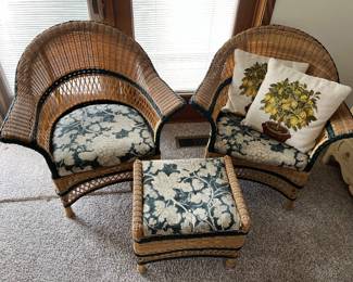 Two wicker chairs, and ottoman by Ebel.