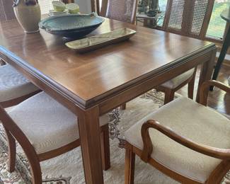 Bernhardt dining table with six chairs and two leaves.