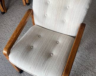 Closer look at one of the four chairs that accompany the oak dining table.