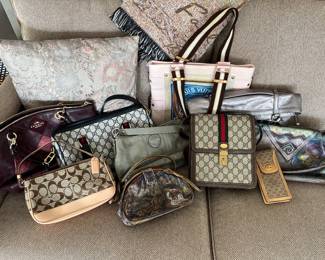 Collection of purses/handbags by Coach, Gucci, Chanel and others.