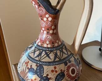 Vintage Mexican terracotta pottery pitcher signed “Mateo’s”.