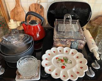 Full kitchen with lots of quality, cookware, dinnerware, and more.