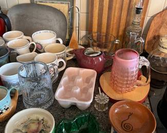 Full kitchen with lots of quality, cookware, dinnerware, and more.