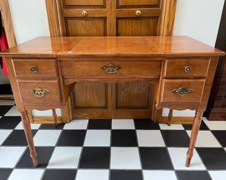 Vintage dressing table with lift-top mirror.