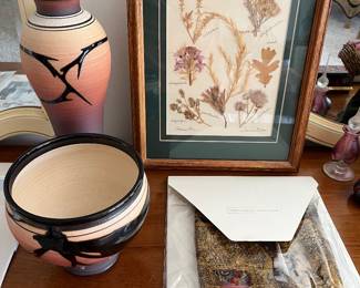 Native American pottery (left in photo).