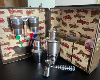 Vintage bar set in case.