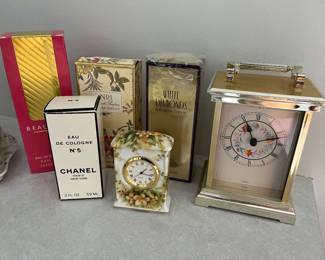 Selection of perfume including Chanel No. 5, Estée Lauder “Beautiful”, and Yves Saint Laurent “Opium”.
