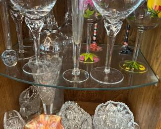 Extensive collection of fine glassware, including crystal, vintage glass, and more.