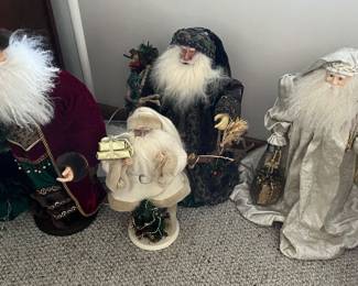 Nice selection of holiday decor, including many Santa figurines.
