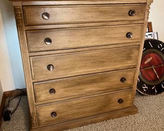 Five-drawer dresser.