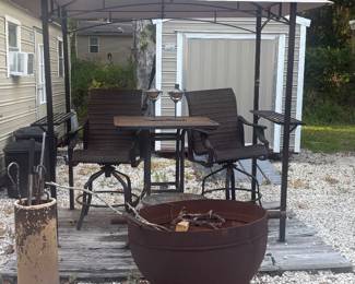 Patio furniture, storage building, fire pit