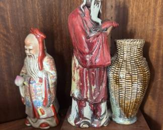 antique Chinese porcelain statues of wisemen or immortals, often referred to as Shou Xing or longevity gods