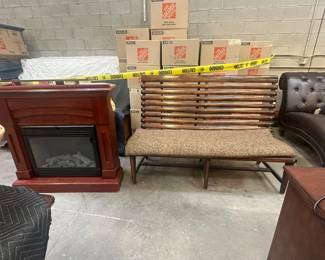 Faux fireplace, wooden bench