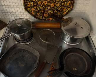 Cast iron. Vintage collapsible wire strainer.