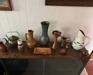 Copper, brass, and studio pottery