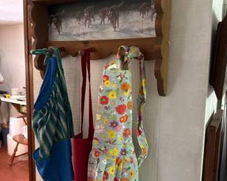 Vintage aprons. Wall hook