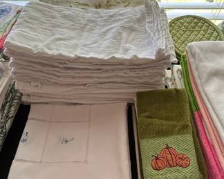Assorted Linens and Kitchen Towels with Seasonal and Decorative Elements