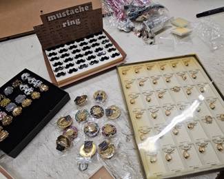 Mustache Rings $3 per flat Ring Necklaces $5 per flat Hat Brooches $0.50 each