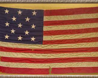 Antique thirteen-star flag, made from wool bunting with zig-zag stich, produced with early electric sewing machine, circa 1896-1920, framed 