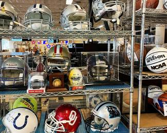 Lots of signed sports memorabilia - football and basketball