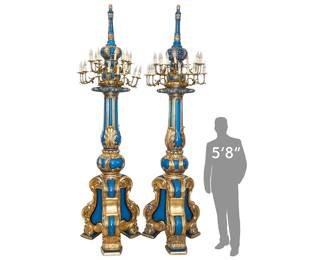 Monumental Italian painted wooden torchieres 