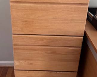 Tall wooden filing cabinet