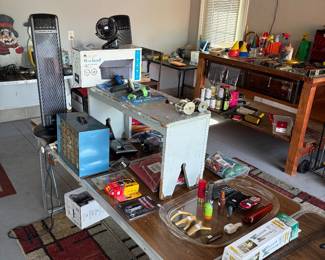 Tower fans, mailbox, fishing reels, multi drawer organizer and label makers.