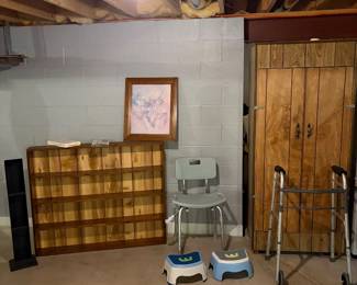Walker, shower chair, step stools, and bookshelf.