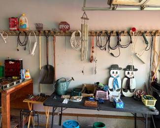 Extension cords, Christmas tree stand, stepstool, yard tools, wind, chimes, watering can and more.