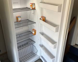 Frigidaire upright freezer.