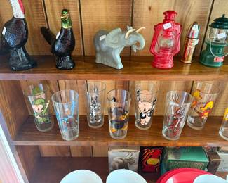 Avon decanters and 1973 looney toon glasses in perfect condition.