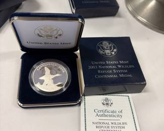 Collection of silver national wildlife refuge medals
