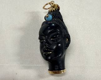 Onyx and 18 karat gold head