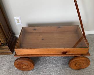 Glass top wagon display table $20