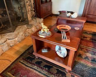 Inlaid mahogany coffee table with end bookcases and turned legs $400